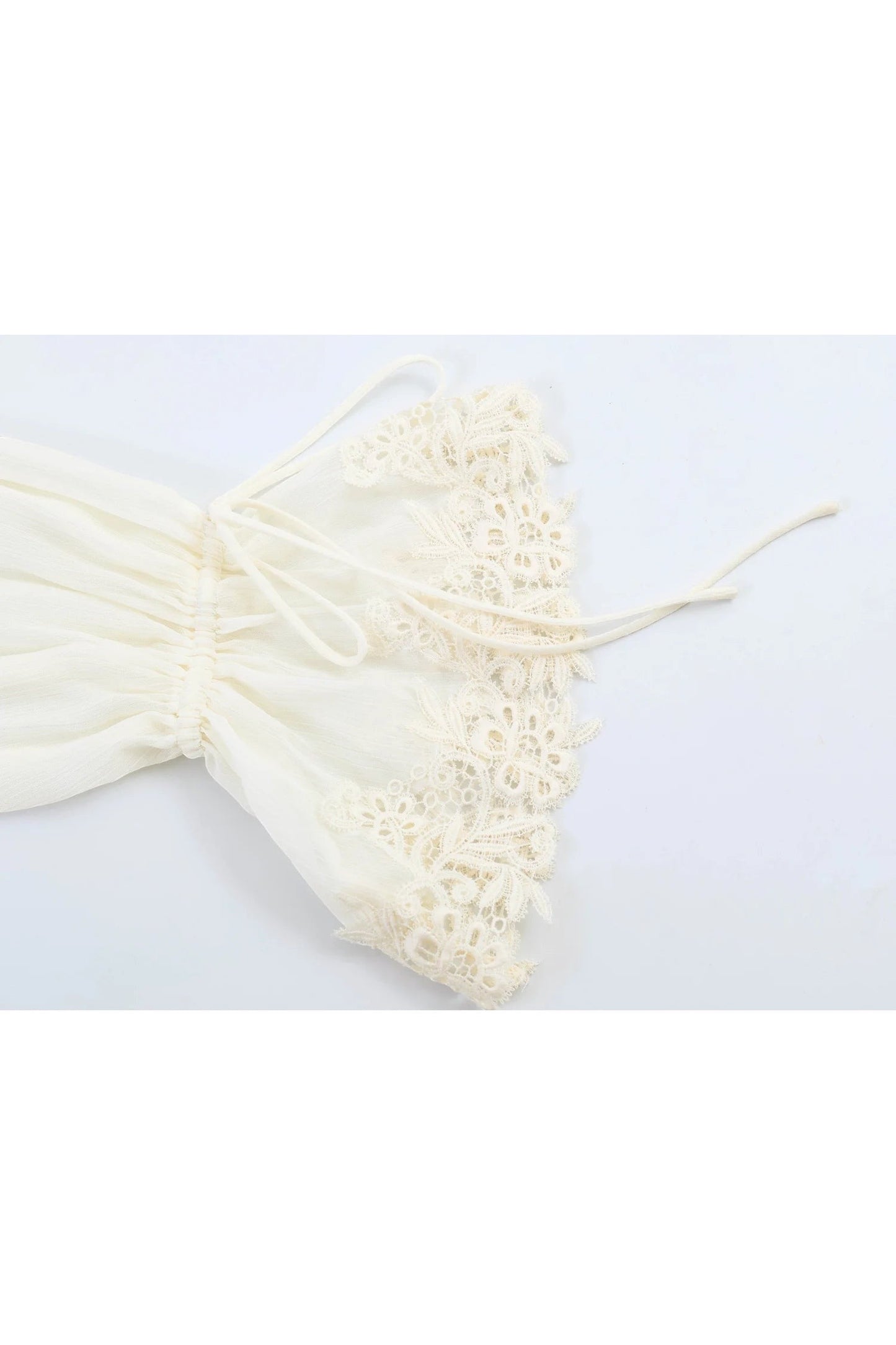 Miraee Paris cream lace blouse sleeve detail with delicate floral embroidery, ruffled trim, and adjustable tie strings