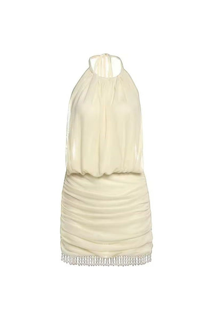 Mirae Paris butter yellow halter neck mini dress with ruched skirt and beaded hem. Soft, feminine, and elegant.