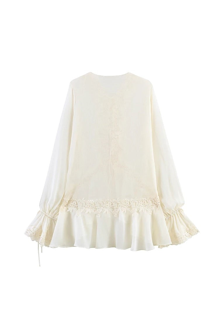 Miraee Paris semi-transparent cream lace blouse with V-neck, ruffled sleeves, and delicate embroidery details.
