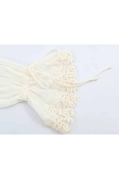 Miraee Paris cream lace blouse sleeve detail with delicate floral embroidery, ruffled trim, and adjustable tie strings