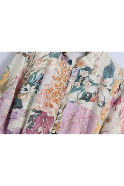 Miraee Paris Lena floral mini dress with long sleeves, button-down front, and vintage-inspired botanical print.