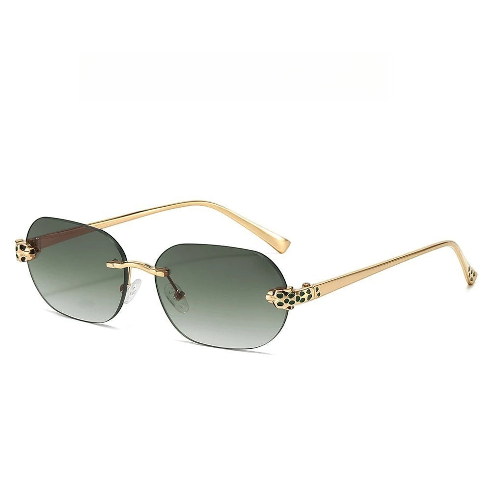 Miraee Paris Noir Panther rimless sunglasses with gradient lenses, gold metal frames, and cheetah-inspired accents.