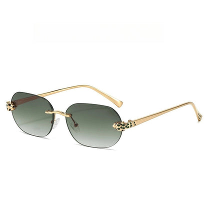 Miraee Paris Noir Panther rimless sunglasses with gradient lenses, gold metal frames, and cheetah-inspired accents.