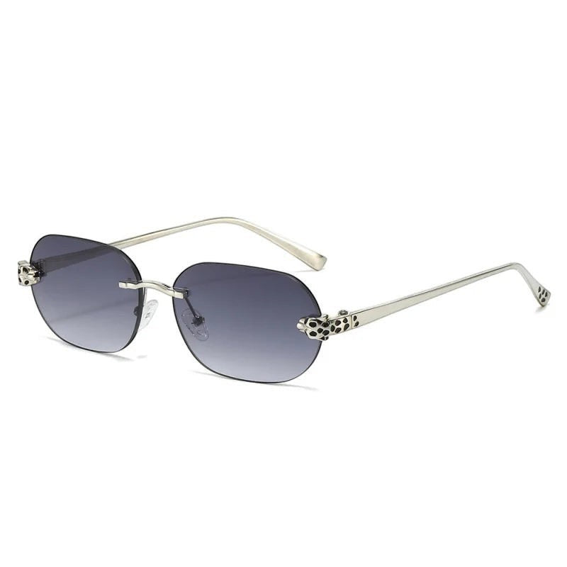 Miraee Paris Noir Panther rimless sunglasses with grey gradient lenses, silver metal frame, and cheetah detail.