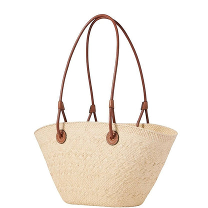 Miraee Paris woven straw shoulder tote handbag with brown leather straps and a structured curved silhouette.